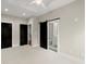Bright bedroom with access to bathroom via a sliding barn door, and two additional interior doors at 2329 Mason Dr # D24, Atlanta, GA 30316