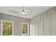 Bedroom featuring board and batten accent wall and large double windows at 2329 Mason Dr # D24, Atlanta, GA 30316