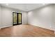 Spacious bedroom with hardwood floors and private balcony access at 2329 Mason Dr # D24, Atlanta, GA 30316
