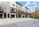 Modern townhome row featuring private balconies and attached garages, perfect for urban living at 2329 Mason Dr # D24, Atlanta, GA 30316