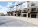 Modern townhomes featuring elevated balconies and attached garages, providing stylish urban living at 2329 Mason Dr # D24, Atlanta, GA 30316