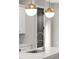 Close up of modern kitchen island sink with quartz countertop, stainless steel faucet, and pendant lights at 2329 Mason Dr # D24, Atlanta, GA 30316