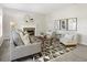 Cozy living room with a fireplace, neutral tones, and stylish decor for a relaxing atmosphere at 429 Tannenhill Pl, Sugar Hill, GA 30518
