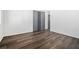 Bright bedroom featuring wood-look floors and ample closet space at 102 Dahlia Nw Ave, Atlanta, GA 30314