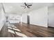 Bright, open-concept living space with hardwood floors, kitchen and neutral color palette at 102 Dahlia Nw Ave, Atlanta, GA 30314