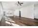 Bright, open-concept living space with hardwood floors, kitchen and neutral color palette at 102 Dahlia Nw Ave, Atlanta, GA 30314