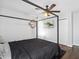 Stylish bedroom features a four-poster bed, contemporary decor, and hardwood floors at 1599 Ezra Church Nw Dr, Atlanta, GA 30314