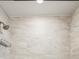 Close-up of a shower featuring tiled walls and modern fixtures at 1599 Ezra Church Nw Dr, Atlanta, GA 30314