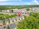 Aerial view showcasing the neighborhood, landscaping, and proximity to nearby amenities at 1908 Weston Ln, Tucker, GA 30084
