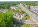 Aerial view showcasing the neighborhood, landscaping, and proximity to nearby amenities at 1908 Weston Ln, Tucker, GA 30084