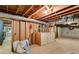 Unfinished basement featuring exposed ductwork and wooden support beams ready for customization at 3573 Turtle Cove Se Ct, Marietta, GA 30067