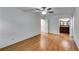 Inviting bedroom with hardwood floors, ceiling fan and ensuite bathroom access at 3573 Turtle Cove Se Ct, Marietta, GA 30067