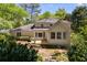 Well-maintained exterior features a deck and landscaped yard, perfect for relaxing or entertaining guests at 3573 Turtle Cove Se Ct, Marietta, GA 30067