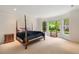 Bright bedroom with large windows, natural light, and neutral color palette at 492 Conway Manor Nw Dr, Atlanta, GA 30327