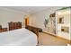 Bedroom with a whimsical mural and doorway leading to a bathroom with a large vanity area at 492 Conway Manor Nw Dr, Atlanta, GA 30327