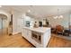 Bright kitchen features a large center island, stainless steel appliances, and an adjacent dining area at 492 Conway Manor Nw Dr, Atlanta, GA 30327