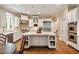 Bright kitchen features a large center island, stainless steel appliances, eat in kitchen and ample storage space at 492 Conway Manor Nw Dr, Atlanta, GA 30327