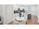 Eat-in kitchen features stainless appliances, an island with bar stool seating, and modern finishes at 1095 Tucker Ave # 207, Atlanta, GA 30310