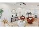 Bright living room featuring stylish decor, hardwood floors, and a ceiling fan at 1095 Tucker Ave # 207, Atlanta, GA 30310
