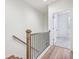 Staircase with dark metal railings and wood treads at 1095 Tucker Ave # 207, Atlanta, GA 30310