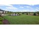 Expansive backyard with fire pit area and lush landscaping at 126 Kenney Way, Locust Grove, GA 30248