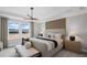 Spacious bedroom with large windows, tray ceilings, and stylish decor at 126 Kenney Way, Locust Grove, GA 30248