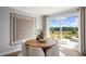 Bright dining area with round table, comfortable chairs, and sliding glass doors to the backyard at 126 Kenney Way, Locust Grove, GA 30248