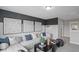 A stylish living room offers comfortable seating and modern decor at 126 Kenney Way, Locust Grove, GA 30248