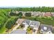 An aerial view showcasing homes, lush greenery, and the community's serene setting at 1620 Diplomat Dr, Cumming, GA 30041