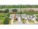 An aerial view of homes showcasing the landscape, rooflines, and community layout at 1620 Diplomat Dr, Cumming, GA 30041