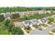 An aerial view of homes highlighting the neighborhood's design, rooflines, and landscaping at 1620 Diplomat Dr, Cumming, GA 30041