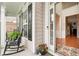 Open foyer with hardwood flooring leads into the home's interior spaces at 1620 Diplomat Dr, Cumming, GA 30041