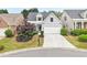 Charming home featuring a manicured lawn, an attached garage, and delightful curb appeal at 1620 Diplomat Dr, Cumming, GA 30041