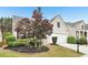 Well maintained front yard, showing the manicured lawn and neat landscaping at 1620 Diplomat Dr, Cumming, GA 30041