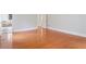 Spacious primary bedroom with hardwood floors and ensuite bath at 2305 Lochinver Sw Ln, Conyers, GA 30094