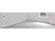 Bright bedroom with neutral paint, carpet, and window bringing in ample natural light at 2305 Lochinver Sw Ln, Conyers, GA 30094