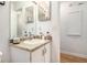 Bathroom featuring a vanity with a sink and a large mirror at 446 Teal Ct, Roswell, GA 30076