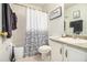 Bathroom with a shower tub combination and a vanity with a white sink at 446 Teal Ct, Roswell, GA 30076
