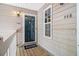 Inviting front porch with space to relax featuring numbers 446 and 448 and a doormat at 446 Teal Ct, Roswell, GA 30076