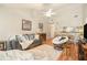 Cozy living room with ample seating, bright natural light, and open floorplan concept at 446 Teal Ct, Roswell, GA 30076