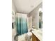 Cozy bathroom with a shower-tub combo, a vanity, and an exhaust fan on the ceiling at 698 Beranda Cir, Douglasville, GA 30134