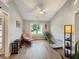 Sitting area offers a chair, side table and window with natural light, making it ideal for relaxation or hobbies at 698 Beranda Cir, Douglasville, GA 30134