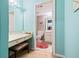 Bathroom with a vanity area and a doorway leading to the toilet at 7098 Stonington Dr, Atlanta, GA 30328