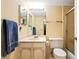 Bathroom featuring a single sink vanity with a neutral color palette at 7098 Stonington Dr, Atlanta, GA 30328