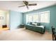 Bedroom with a daybed near the window and light-blue painted walls at 7098 Stonington Dr, Atlanta, GA 30328