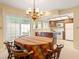 Bright dining area with views of the patio, seamlessly connecting indoor and outdoor spaces for relaxed living at 7098 Stonington Dr, Atlanta, GA 30328