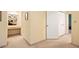 Hallway featuring a vanity, a closet, and neutral color palette at 7098 Stonington Dr, Atlanta, GA 30328