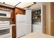 Kitchen featuring a combination washer/dryer hidden in a closet at 7098 Stonington Dr, Atlanta, GA 30328