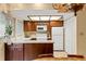 Practical kitchen with plenty of storage, and natural light flowing in from the adjacent dining area at 7098 Stonington Dr, Atlanta, GA 30328