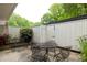 Cozy outdoor patio with a bench and seating area at 7098 Stonington Dr, Atlanta, GA 30328
